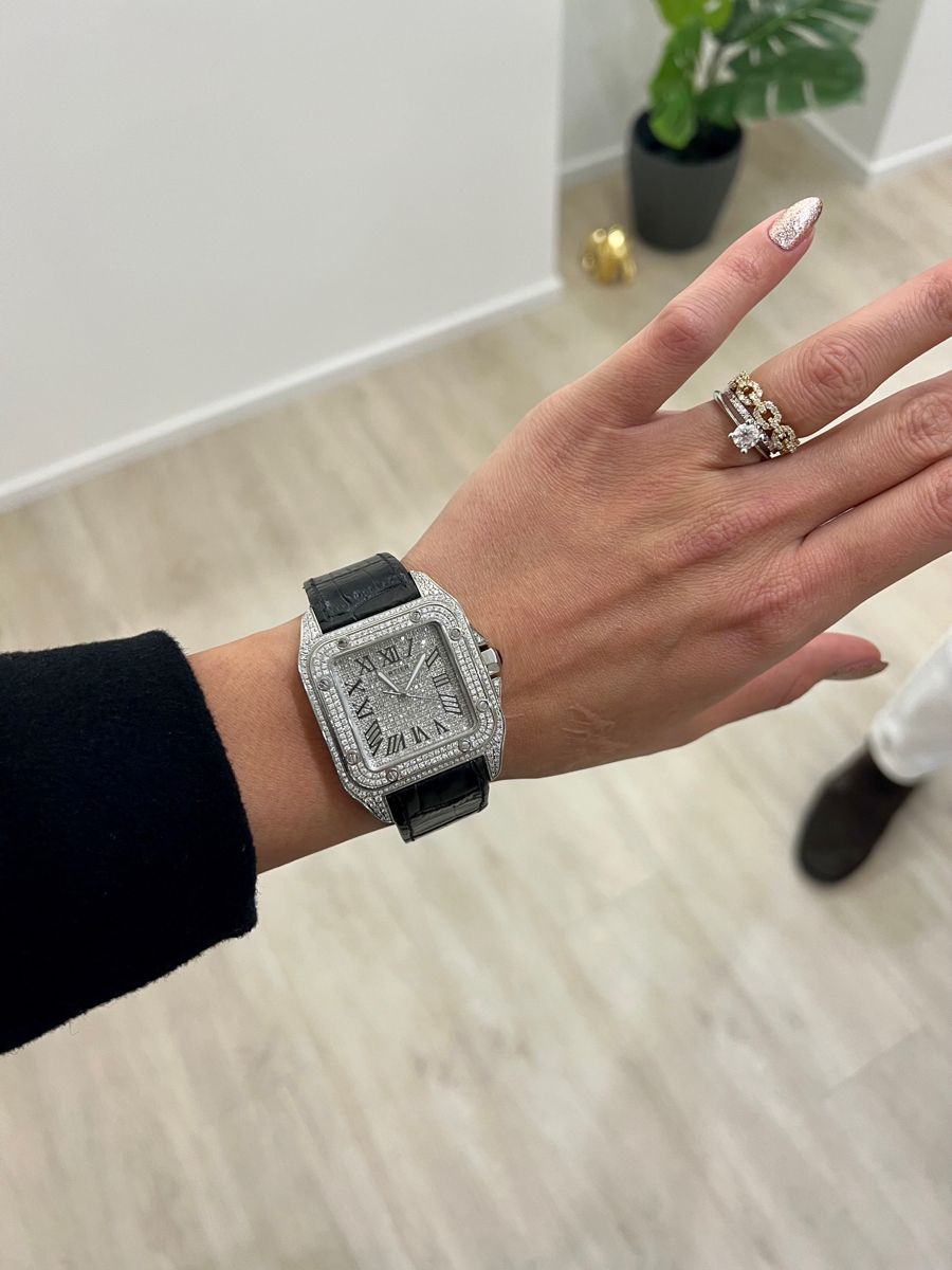 Dấu hiệu nhận biết bánh đà Cartier Santos 100 bị rơ kẹt. 2