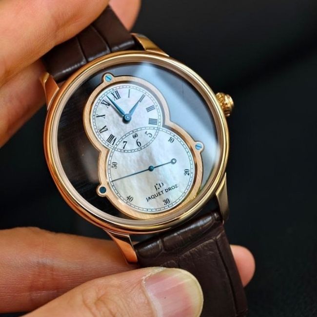 Nghệ thuật chạm khắc rồng phượng thủ công trên mặt số hãng Jaquet Droz. 1